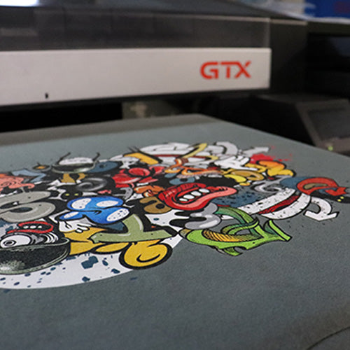 Custom DTG Printing on a t-shirt with graffiti style icons and text in vibrant, full colour